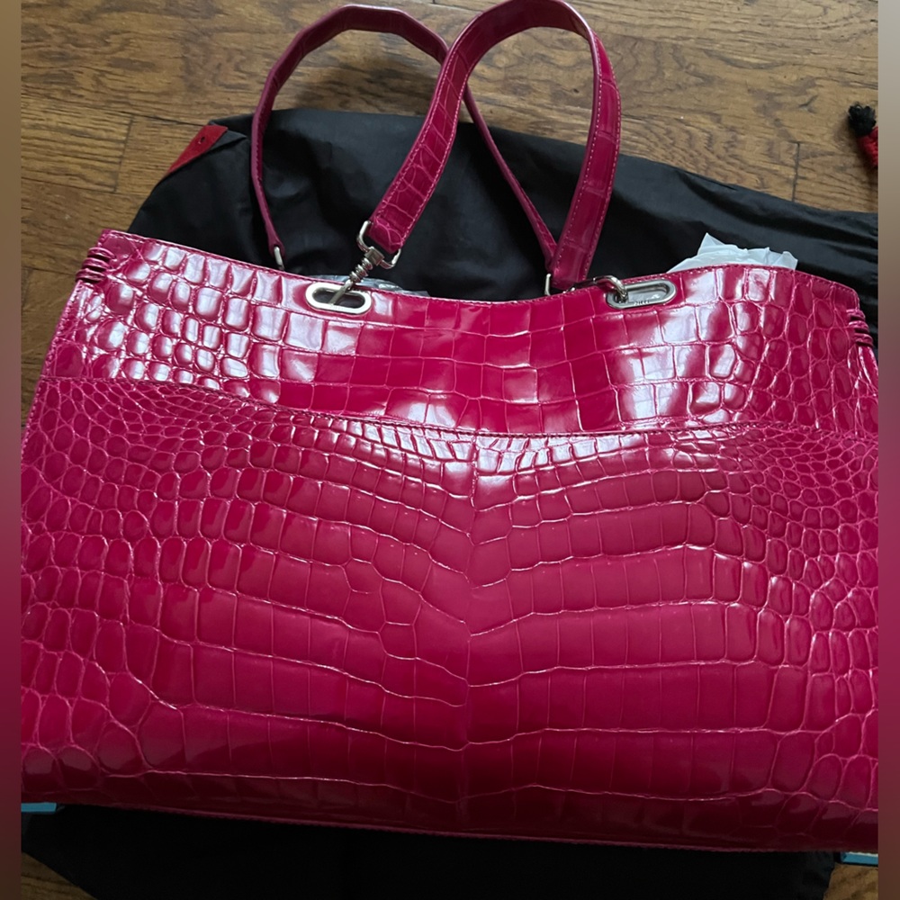 Brand new Zilli Tote never worn!Spacious inside with all necessary compartments.